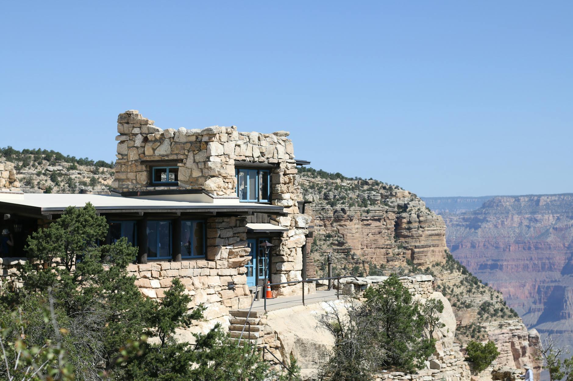 a house on top of a rock mountain