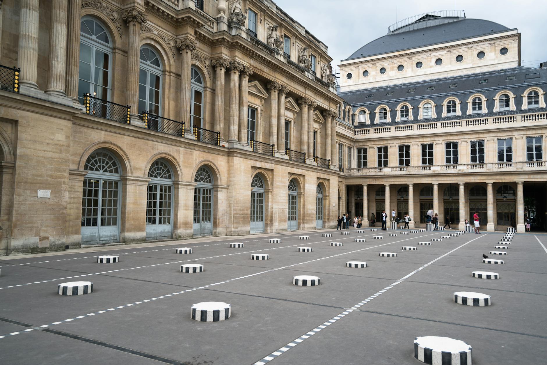 palais royal courtyard in paris on fine day